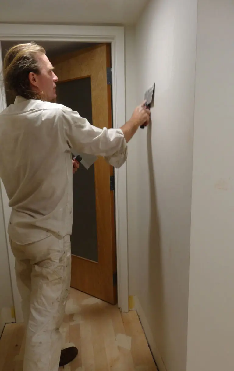 Dave Atkisson at Atkisson Painting painting a hallway